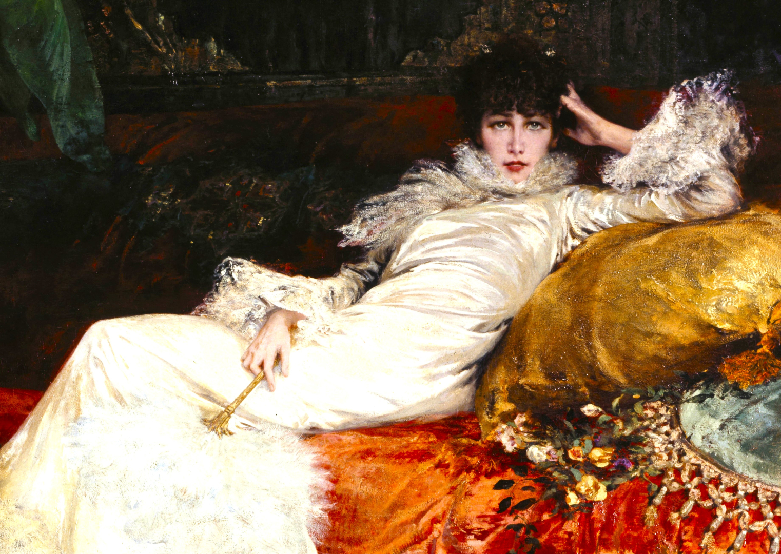 Portrait de Sarah Bernhardt couchée sur un canapé par Georges Clairin